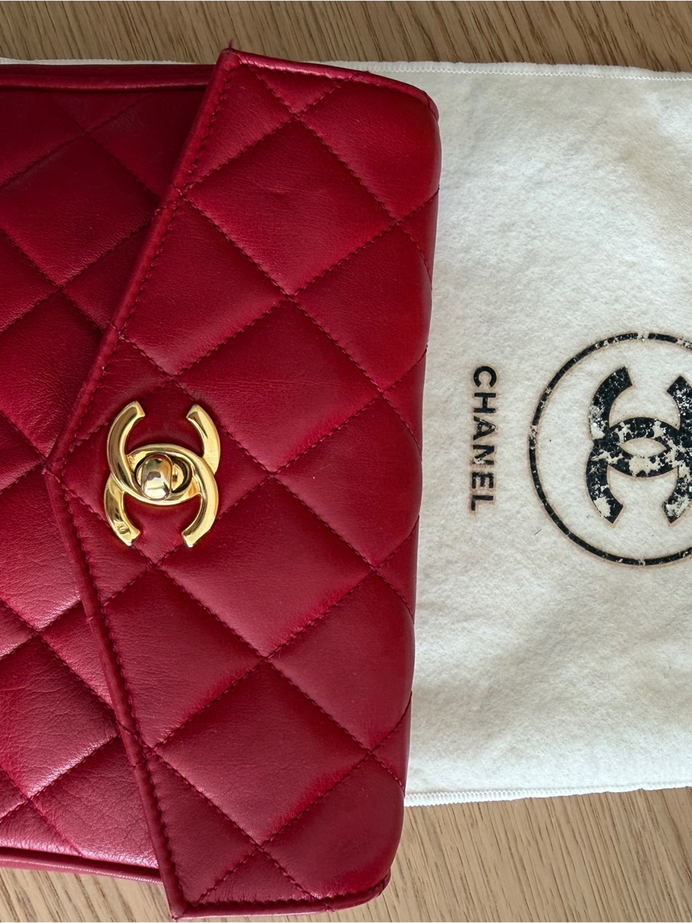 CHANEL Quilted Red Leather Shoulder Bag with Gold CC Turn-Lock
